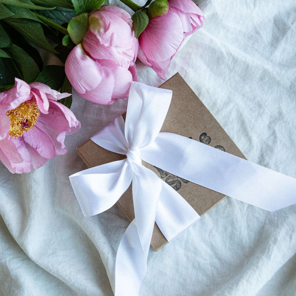 Front view of beeswax strawberry-shaped candle gift box with 5 pieces