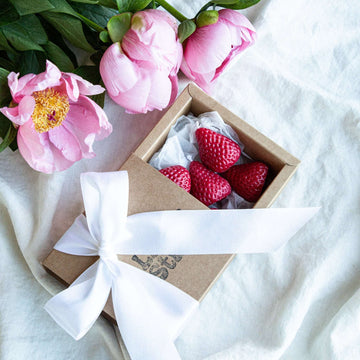 Set of five handmade beeswax strawberry candles in a gift box, perfect for gifting