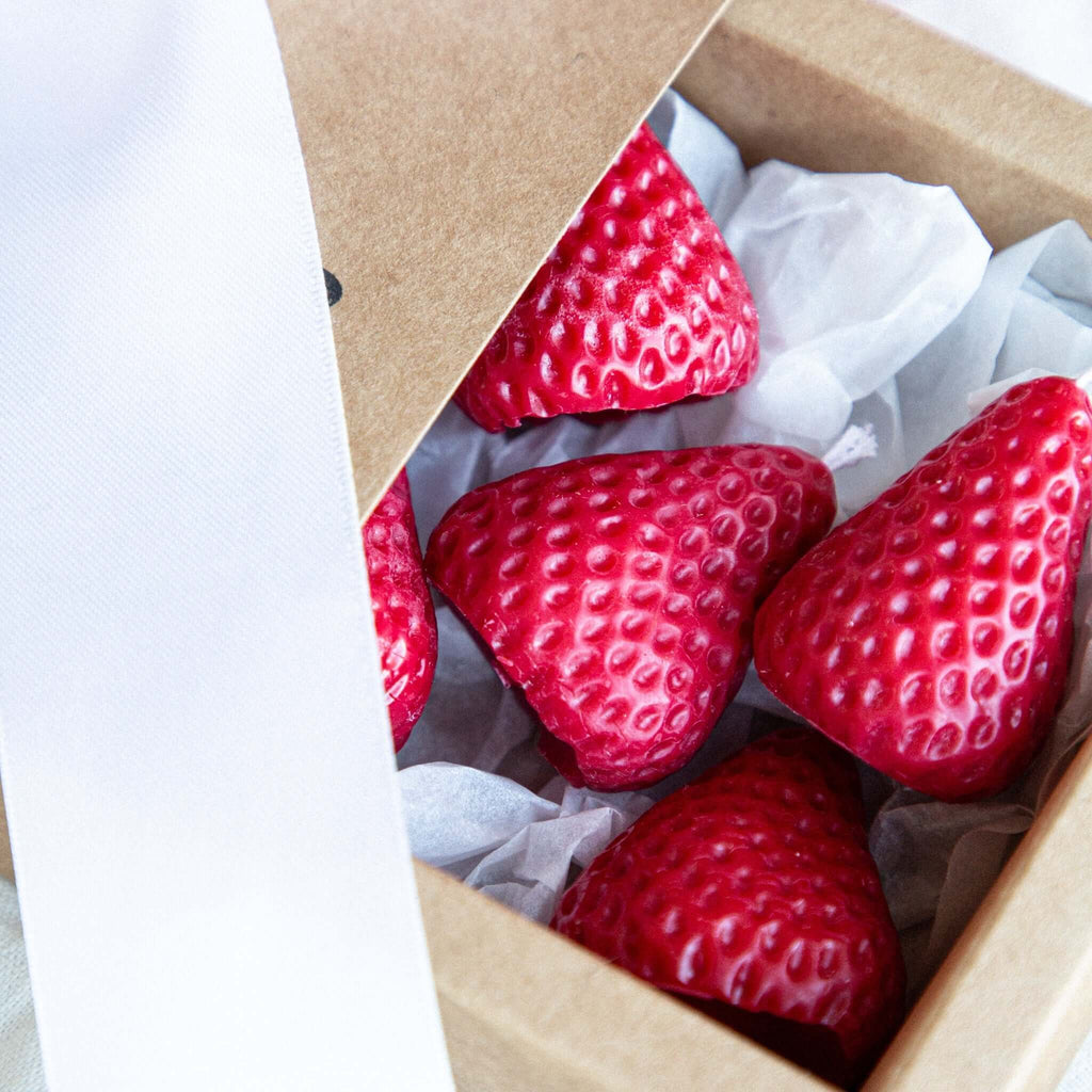 Close-up of beeswax strawberry candle texture and natural wax color