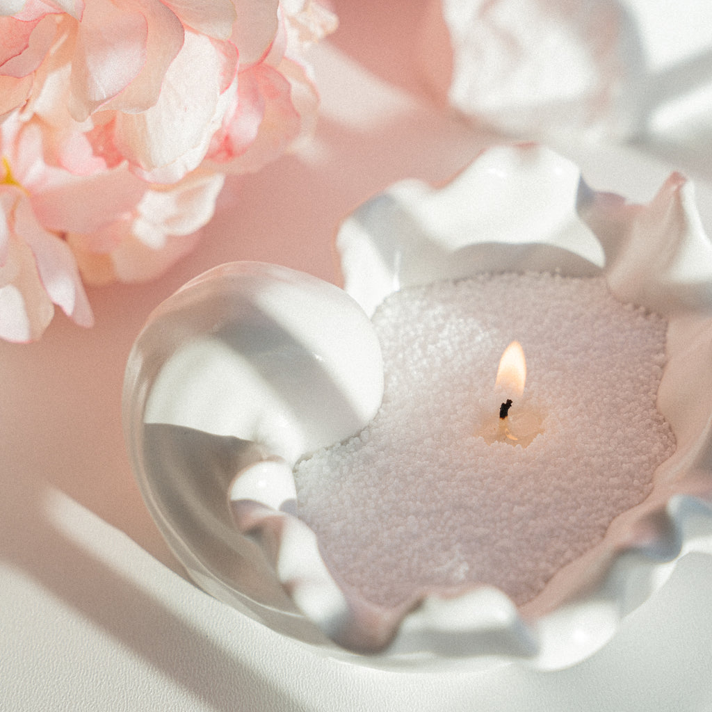 Sveces komplekts ar gliemežvāka dizainu